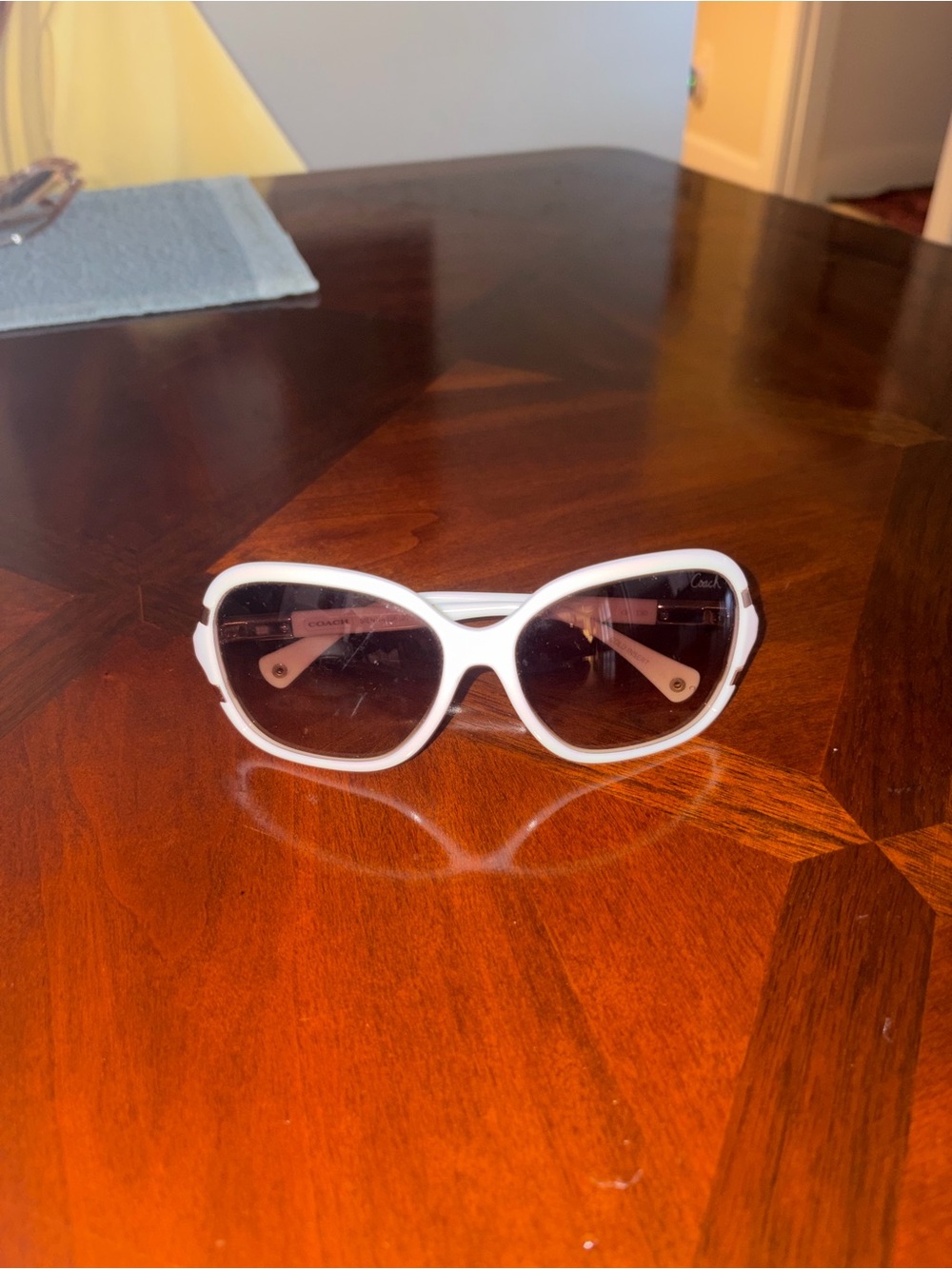 Coach White Oval Women's Sunglasses with Dark Lenses